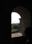 SX28229 Jenni looking at view through window Carcassonne Castle.jpg
